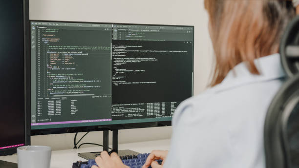 A woman using HTML programming language